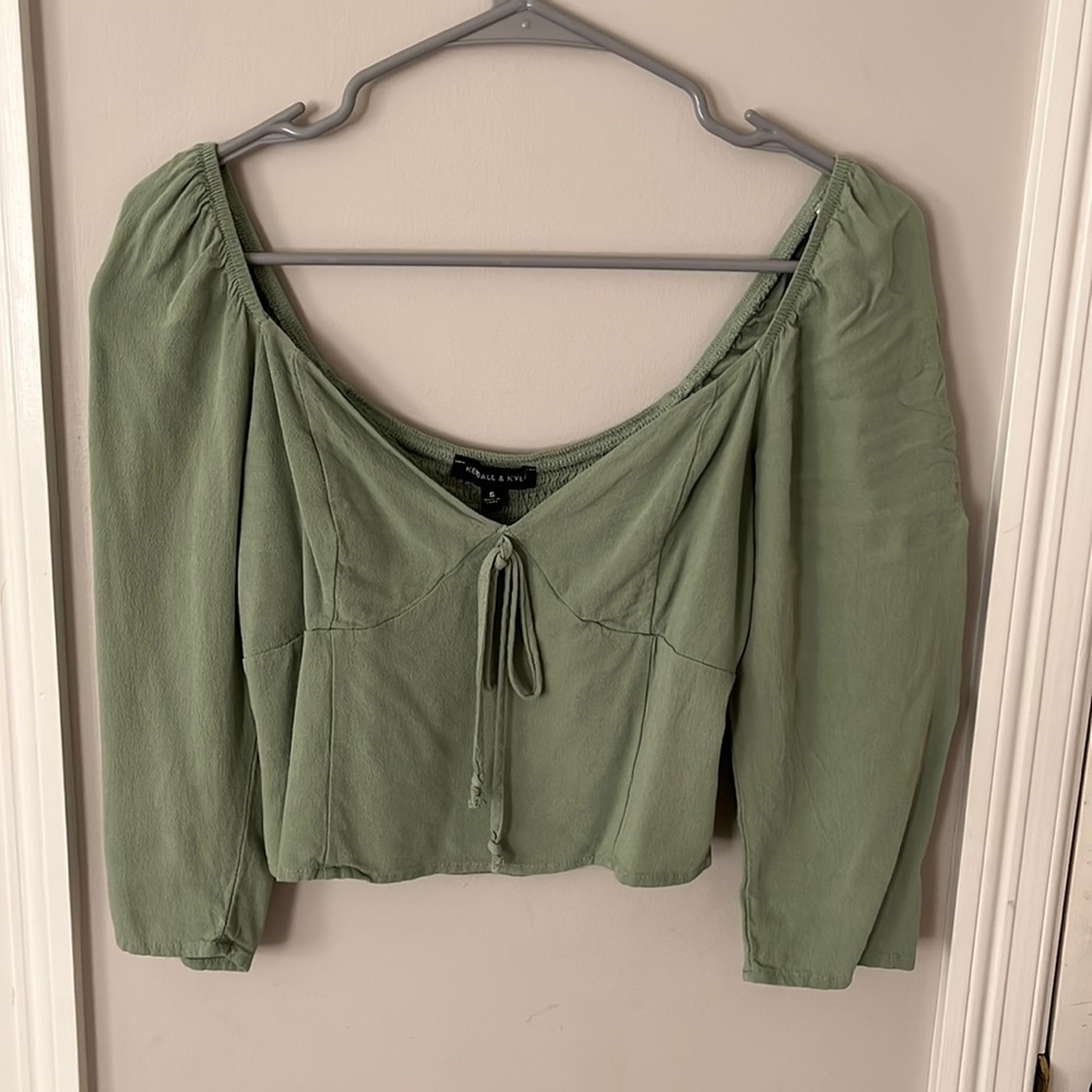 green cropped top